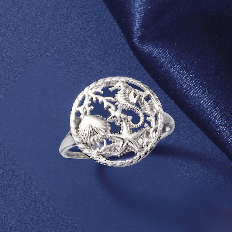 Sterling silver sea life dome ring featuring shell, seahorse, and starfish details