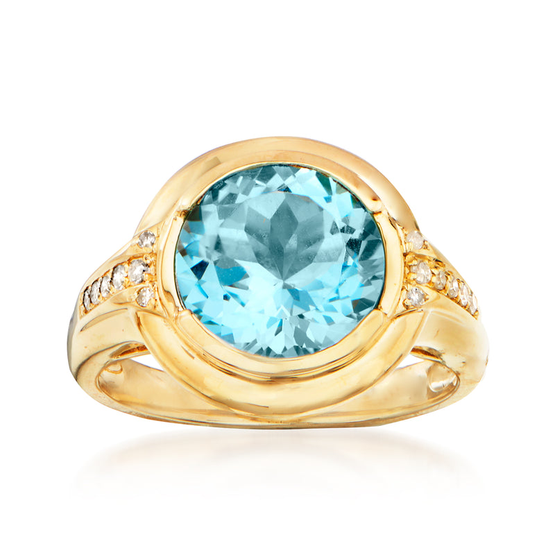 14kt yellow gold ring with oval sky blue topaz and diamond accents