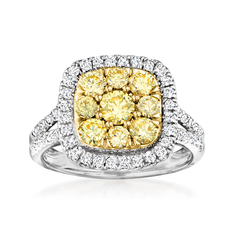 Two-tone gold diamond ring with yellow cushion center and white halo stones
