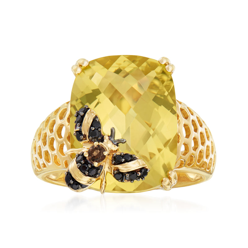 Gold-tone ring with large lemon-yellow gemstone and black bee-inspired accents