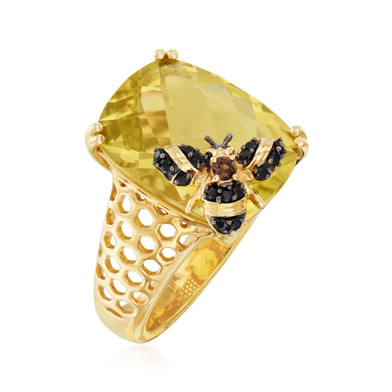 Gold-tone bee style ring with lemon-yellow center stone and lattice openwork band