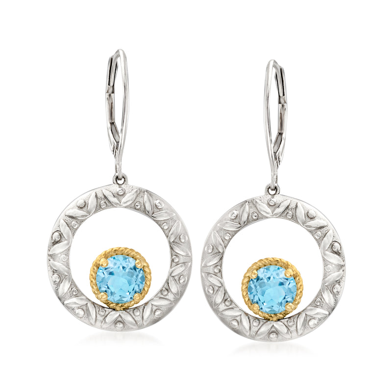 Sterling silver leverback drop earrings with Swiss blue topaz in gold bezel, round halo