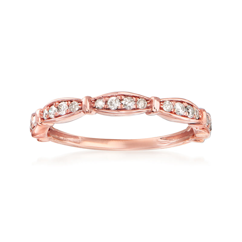 14kt rose gold diamond ring with oval and round stone settings