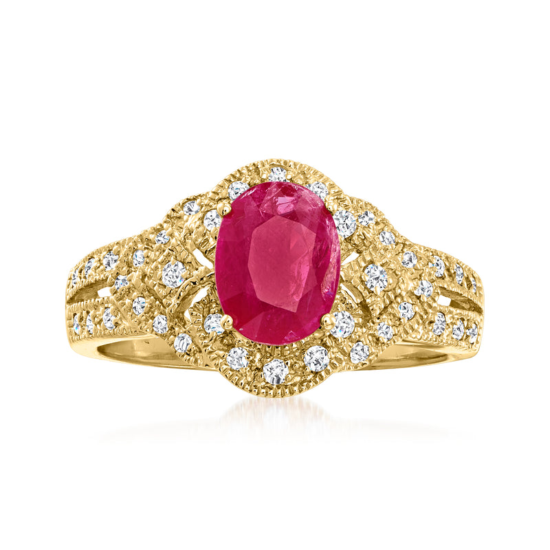Oval ruby gemstone and round diamond halo ring in 14kt yellow gold