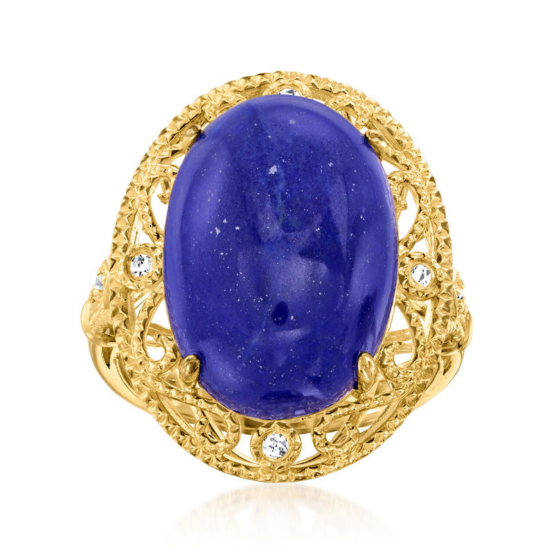 Gold ring with oval lapis cabochon, openwork border and small diamond accents.
