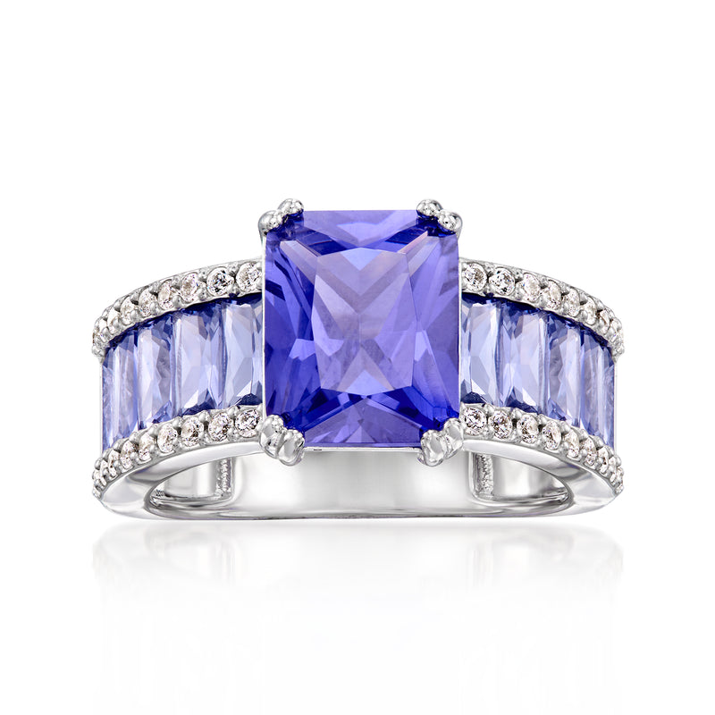 Sterling silver ring with simulated blue tanzanite center and white CZ accents