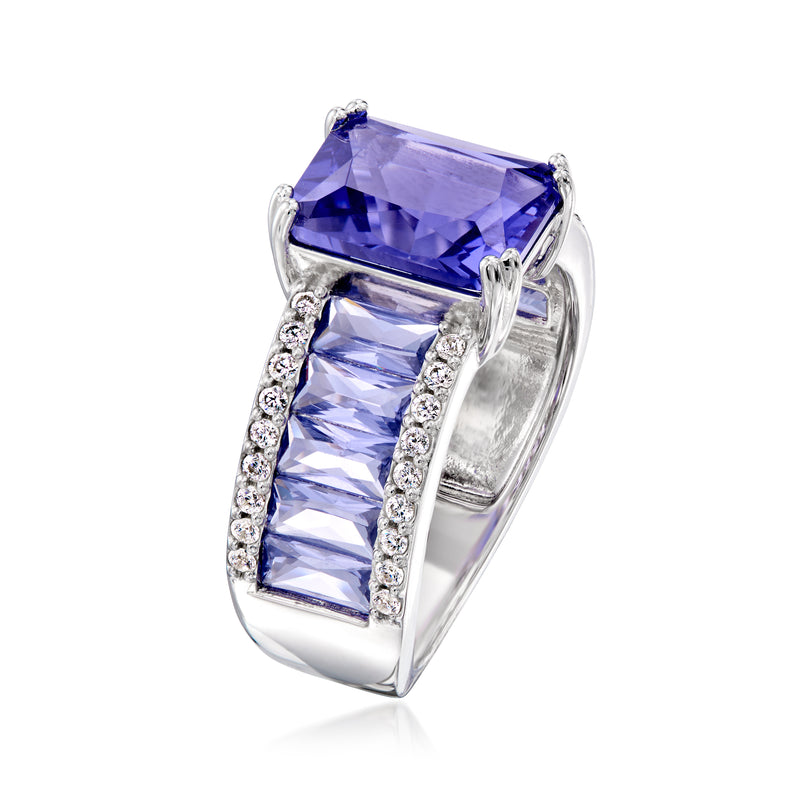Sterling silver ring with blue simulated tanzanite center and white CZ baguette sides
