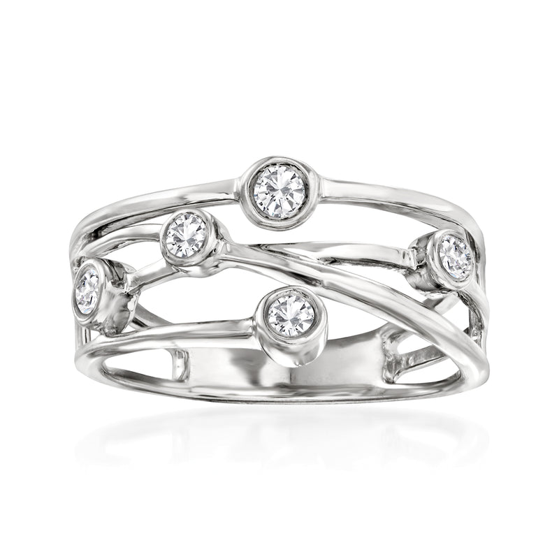 Sterling silver crisscross diamond ring with four round stones, polished band.