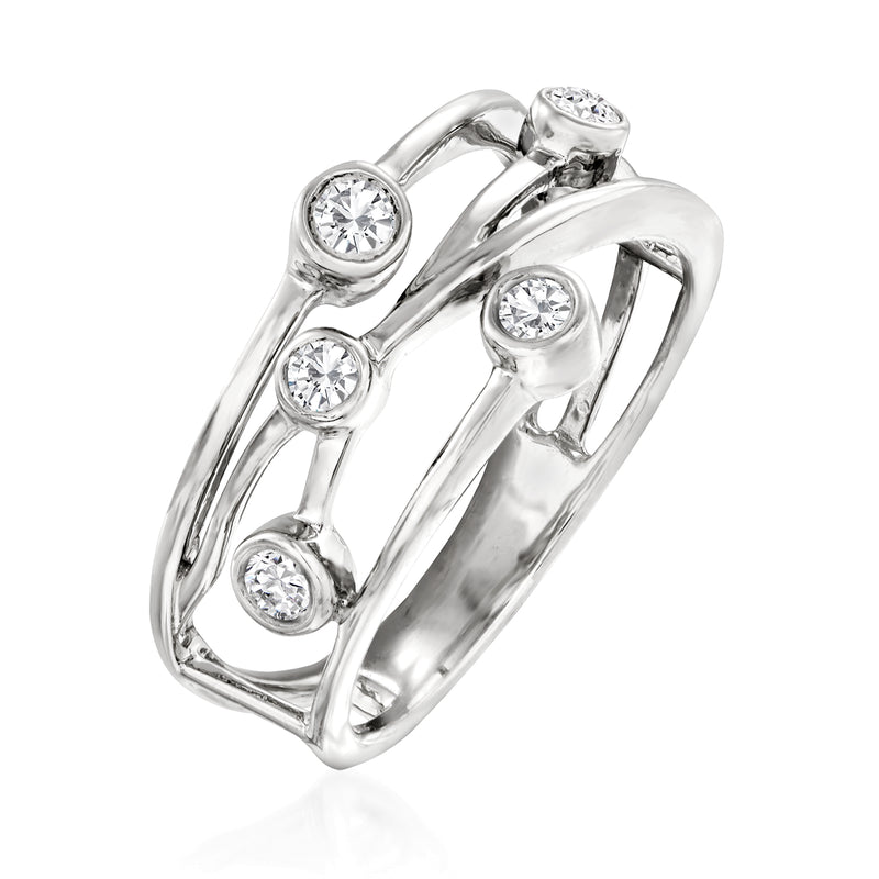 Sterling silver crisscross diamond ring angled view with five round bezel-set stones.