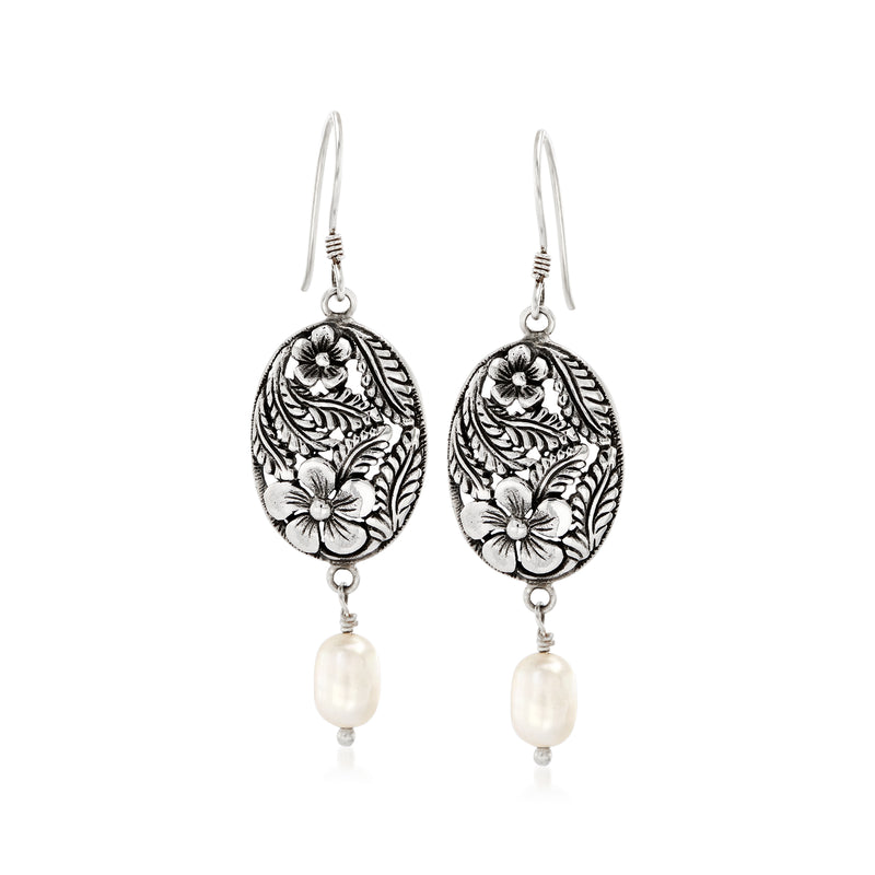 Sterling silver drop earrings with floral engraved oval discs and cultured pearl drops