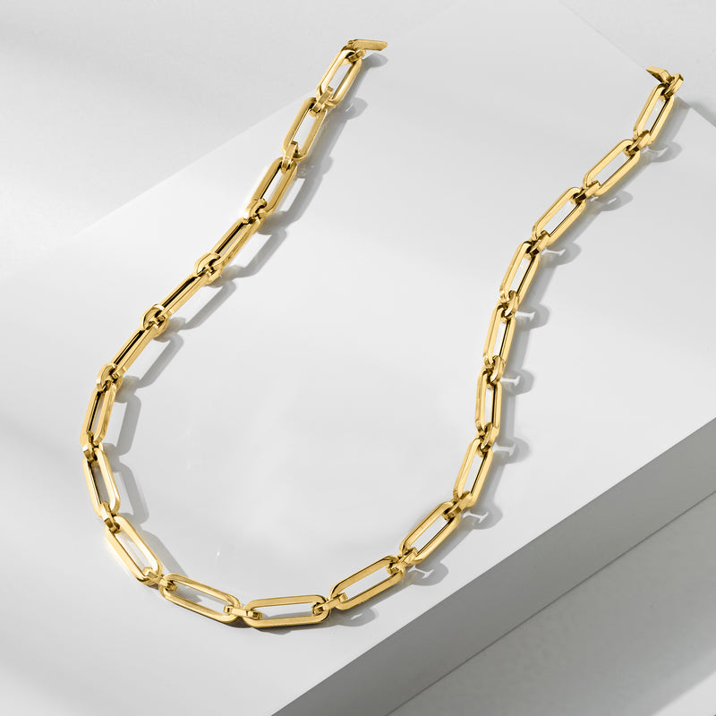 Yellow gold paper clip link necklace, flat lay showing alternating rectangular links