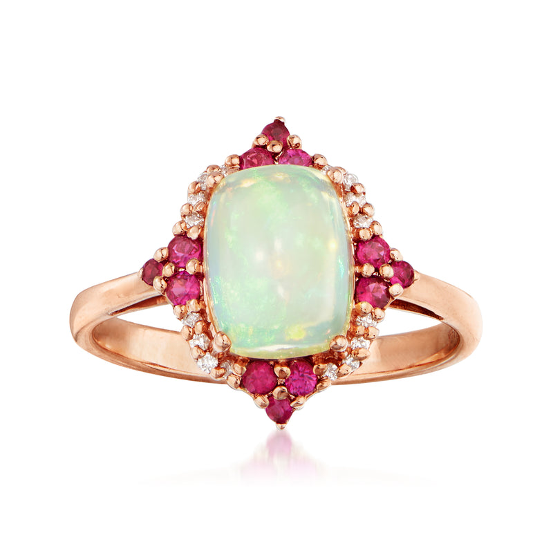 14kt rose gold ring with oval opal center and pink ruby halo accents
