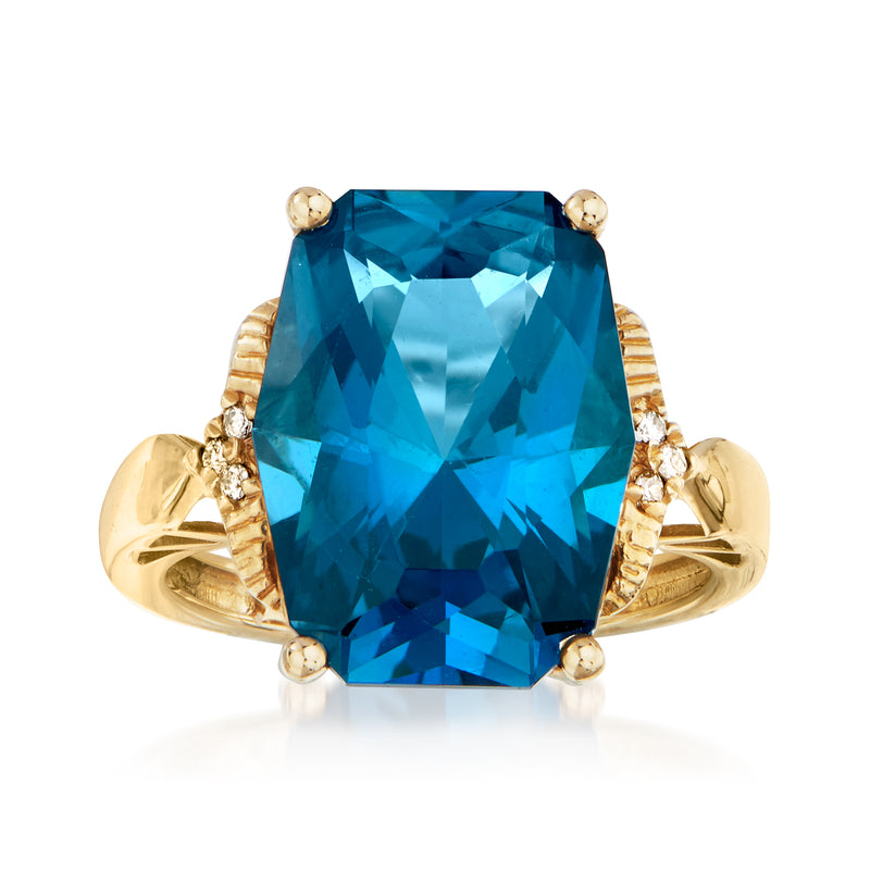 14kt yellow gold ring with large cushion-cut London blue topaz and small side stones
