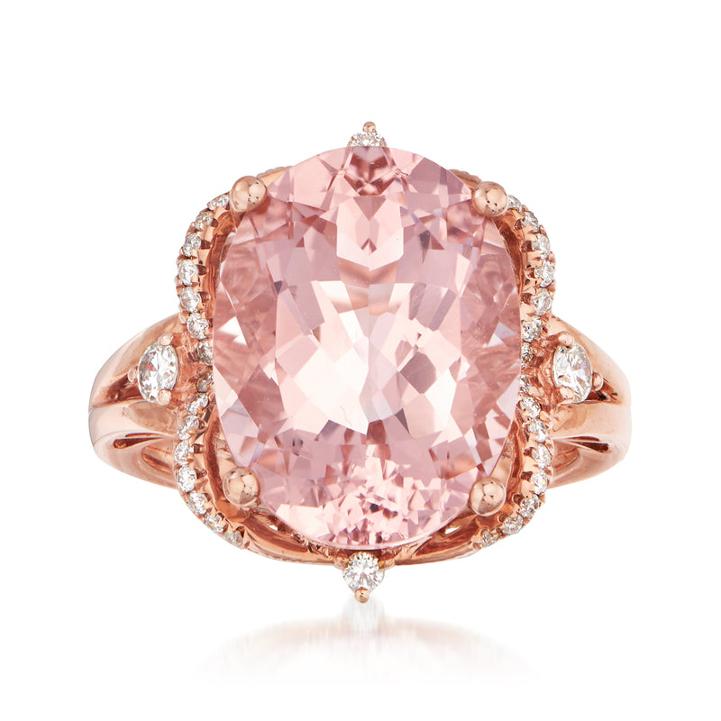 Rose gold ring with large pink oval morganite center and diamond halo accents