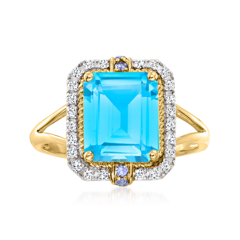 14kt yellow gold ring with large Swiss blue topaz center, diamond halo, sapphire accents
