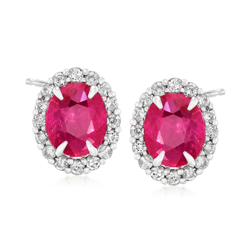 Oval ruby and diamond stud earrings with halo, 18kt white gold posts