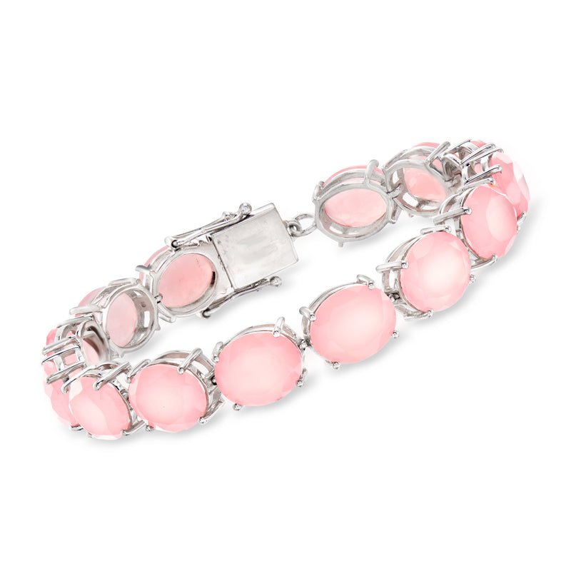 Sterling silver bracelet with linked pink oval chalcedony cabochons and secure clasp