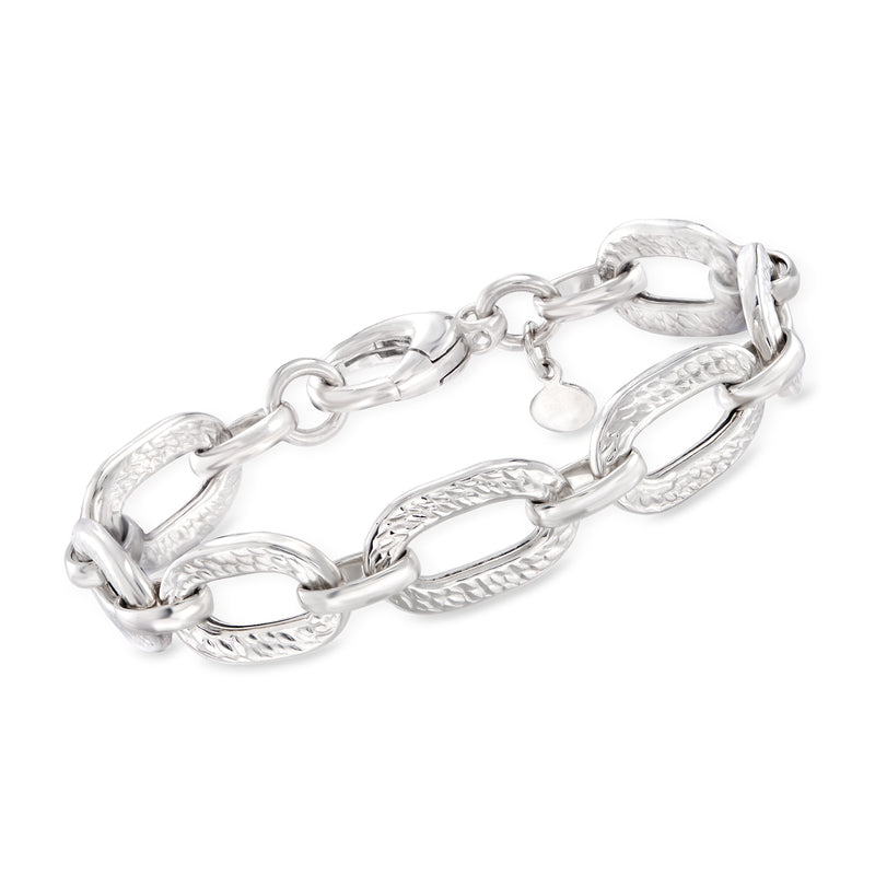 Sterling silver link bracelet with hammered oval links and polished details