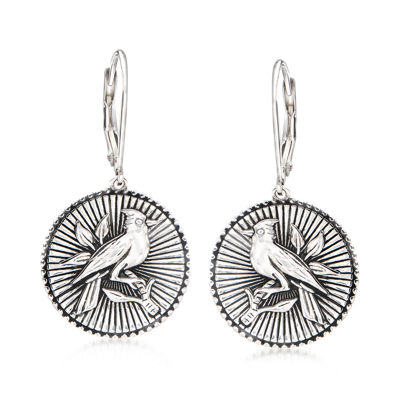 Silver disc drop earrings with engraved bird and sunburst design, leverback closure