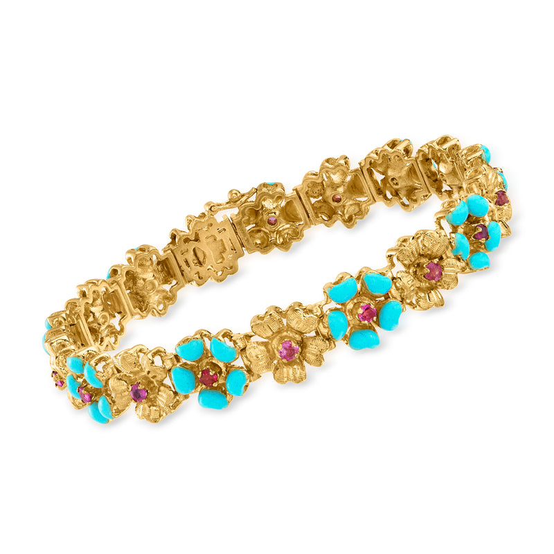 Vintage yellow gold flower bracelet with ruby and blue enamel accents