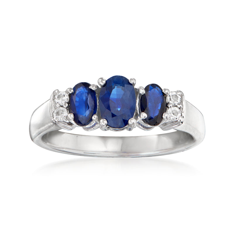 Sterling silver sapphire ring with three blue oval stones and white topaz accents