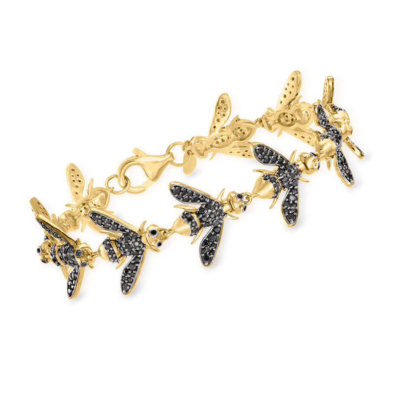 Gold-tone bumblebee charm bracelet with black gem inlays and link chain, lobster clasp