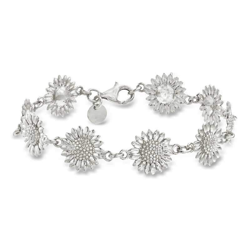 Sterling silver sunflower charm bracelet with linked round daisy motifs and clasp