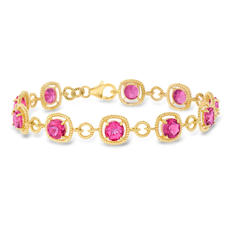 Gold-tone bracelet with pink round gemstones in oval halo settings and center clasp