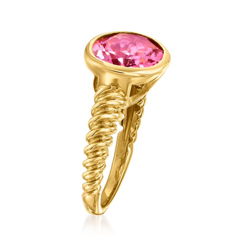Pink oval gemstone ring in gold over sterling with twisted rope setting