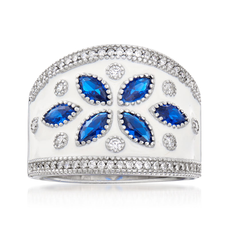 Sterling silver ring with blue marquise stones, clear CZ accents, and white enamel