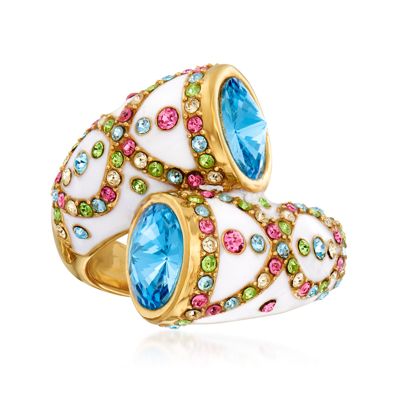 Gold-tone crystal ring with white enamel and multicolor stones, featuring blue oval center