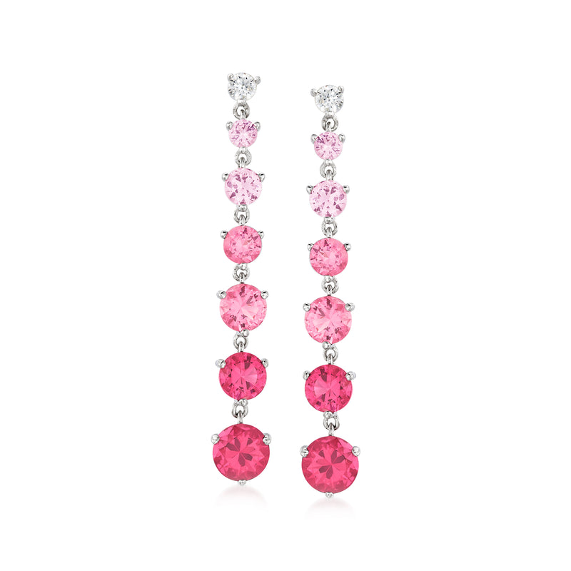 Sterling silver drop earrings with dangling round pink gemstones and clear accents