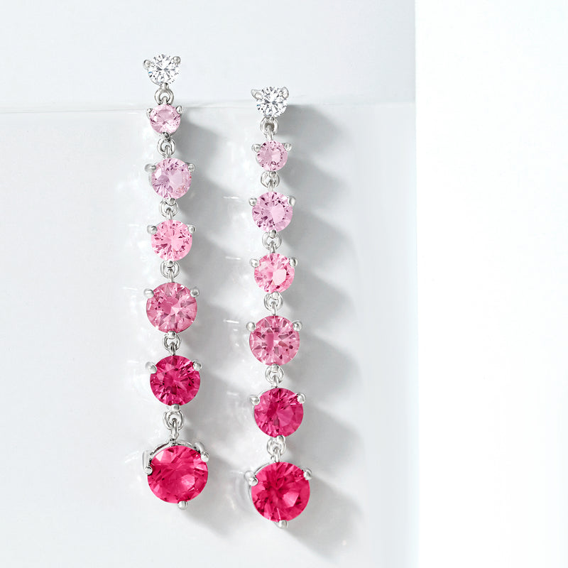 Sterling silver drop earrings, long line of round pink stones with sparkling top