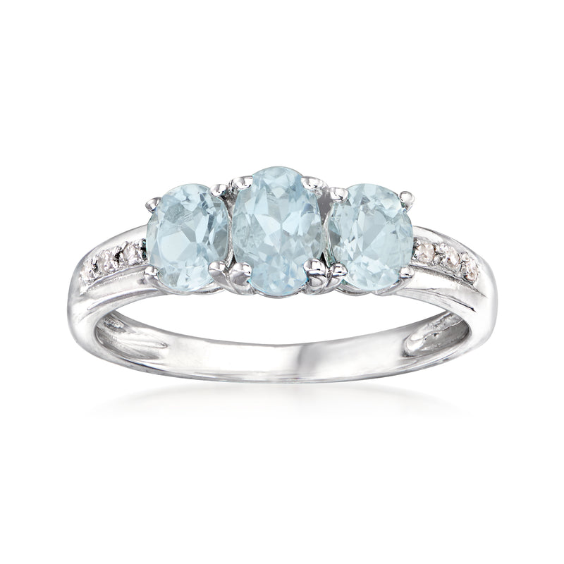 Sterling silver aquamarine ring with light-blue stones and diamond accents