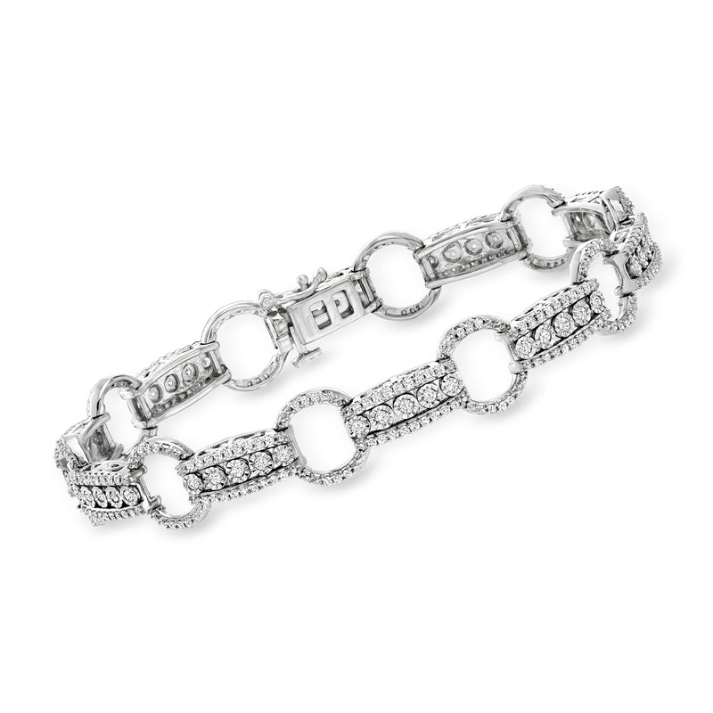 Sterling silver bracelet with circular and bar crystal accents, hinged clasp