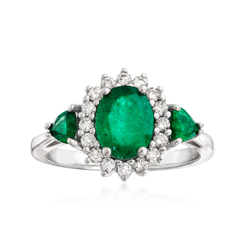 14kt white gold ring with emerald-cut green gemstone and round diamond halo