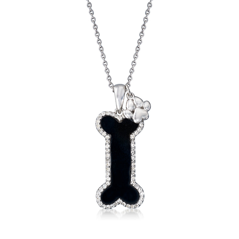 Sterling silver dog bone pendant necklace with black onyx and paw print accents