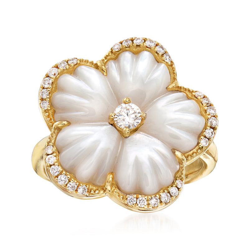 14kt yellow gold flower ring with mother-of-pearl petals, diamond halo, and center stone