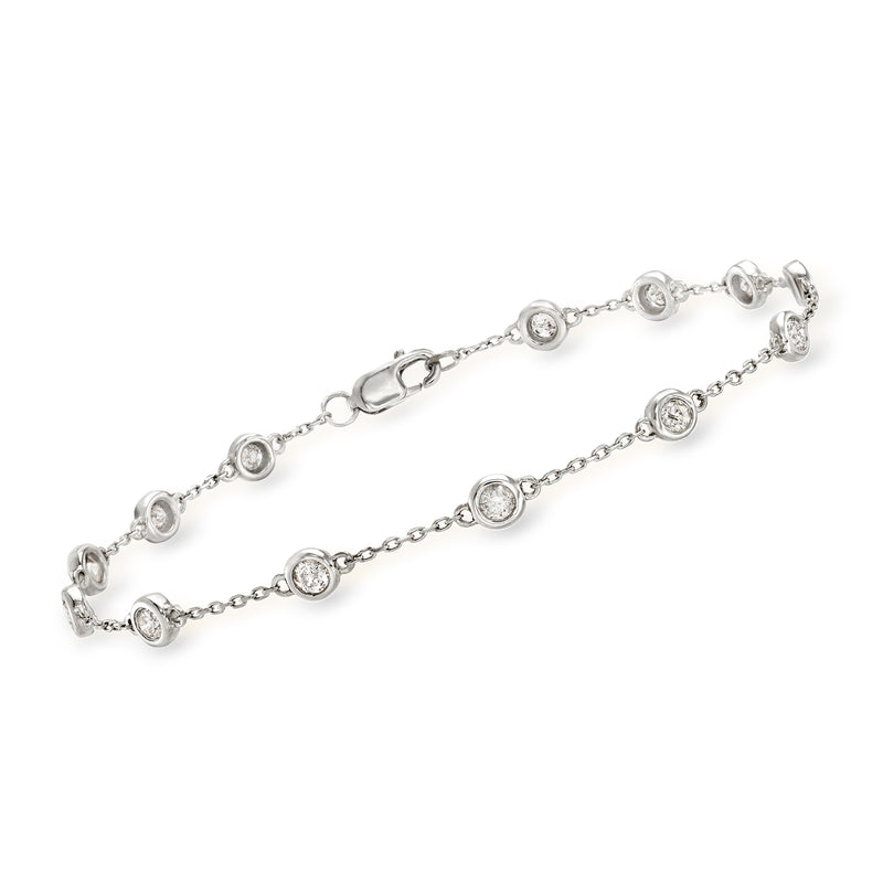 Sterling silver diamond station bracelet with round bezel-set stones in linked circles