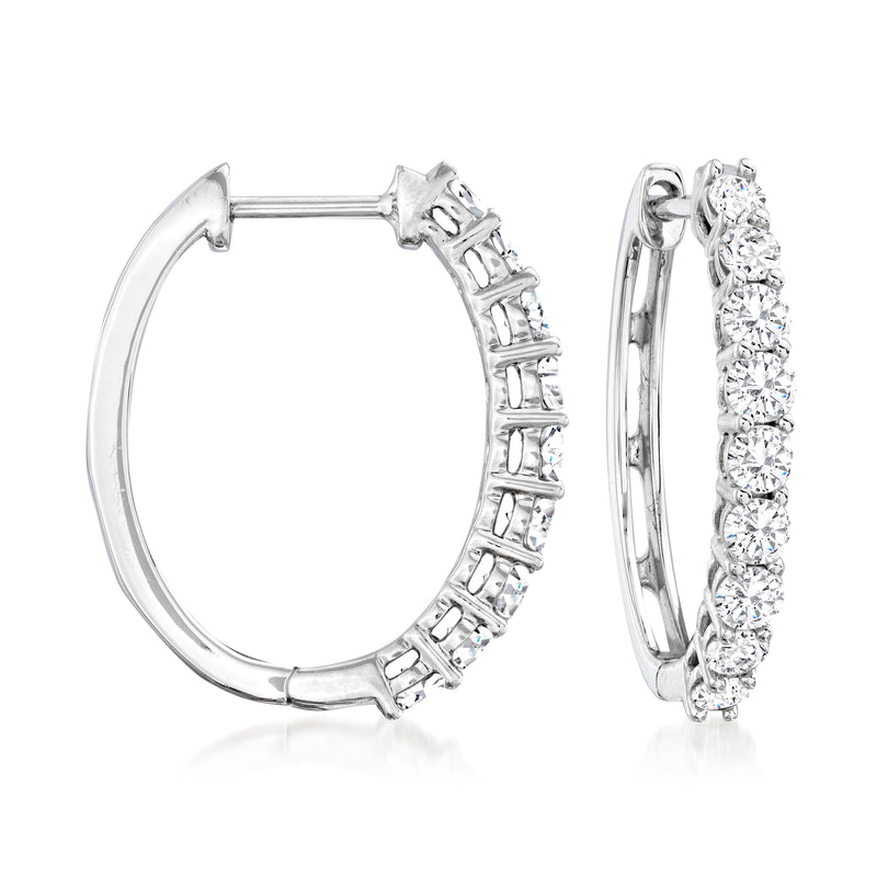 14kt white gold oval hoop earrings with diamond-like stones, hinged backs