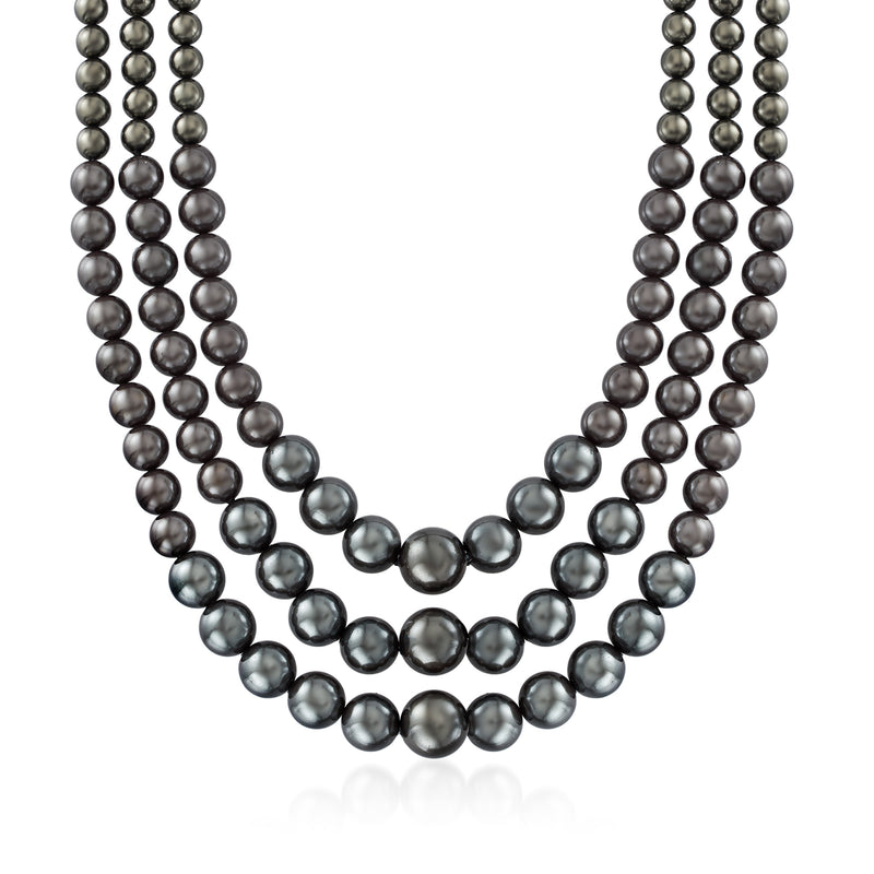 Three-strand black shell pearl necklace with graduated round beads, V-shape
