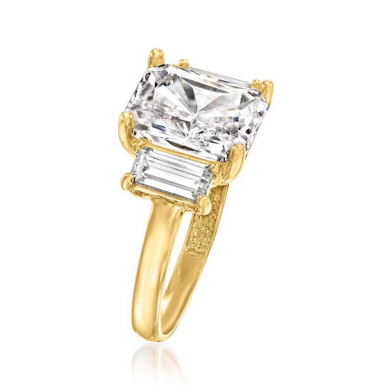 Square-cut CZ three-stone ring in 14kt yellow gold with baguette side stones, angled