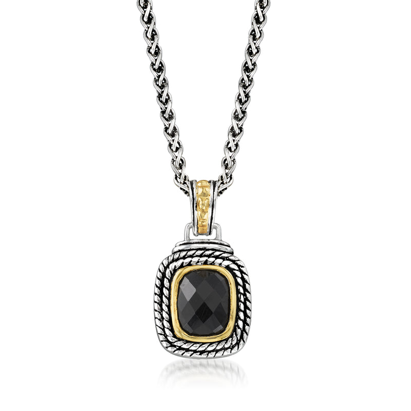Sterling silver pendant necklace with oval black onyx and yellow gold bezel