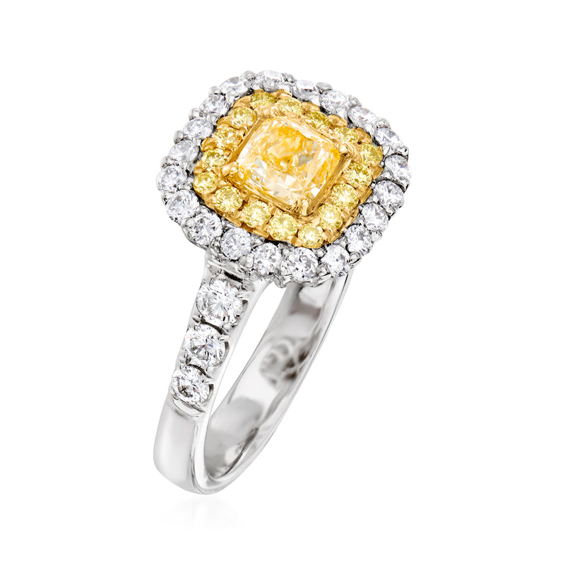 Two-tone gold ring with cushion yellow center diamond and round white halo