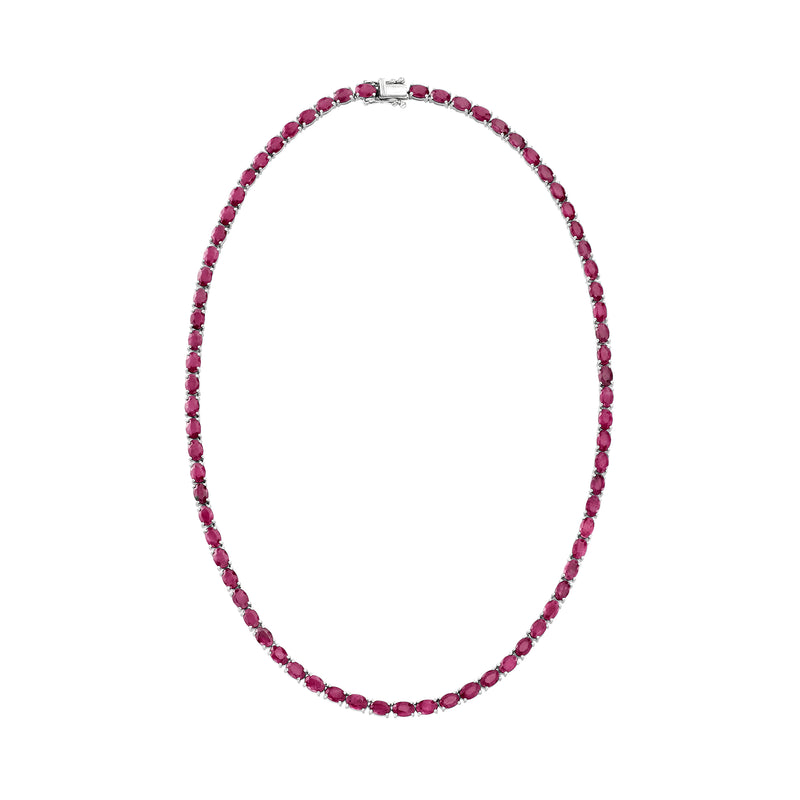 Oval pink ruby tennis necklace in sterling silver shown hanging, continuous gemstone row