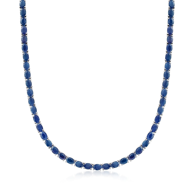 Sapphire tennis necklace in sterling silver with oval blue stones, linked bezel setting