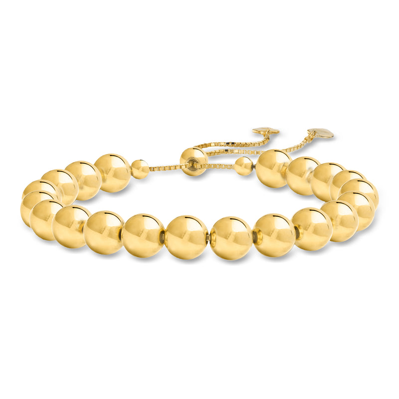 Gold bead bolo bracelet with round polished beads and sliding cord ends.