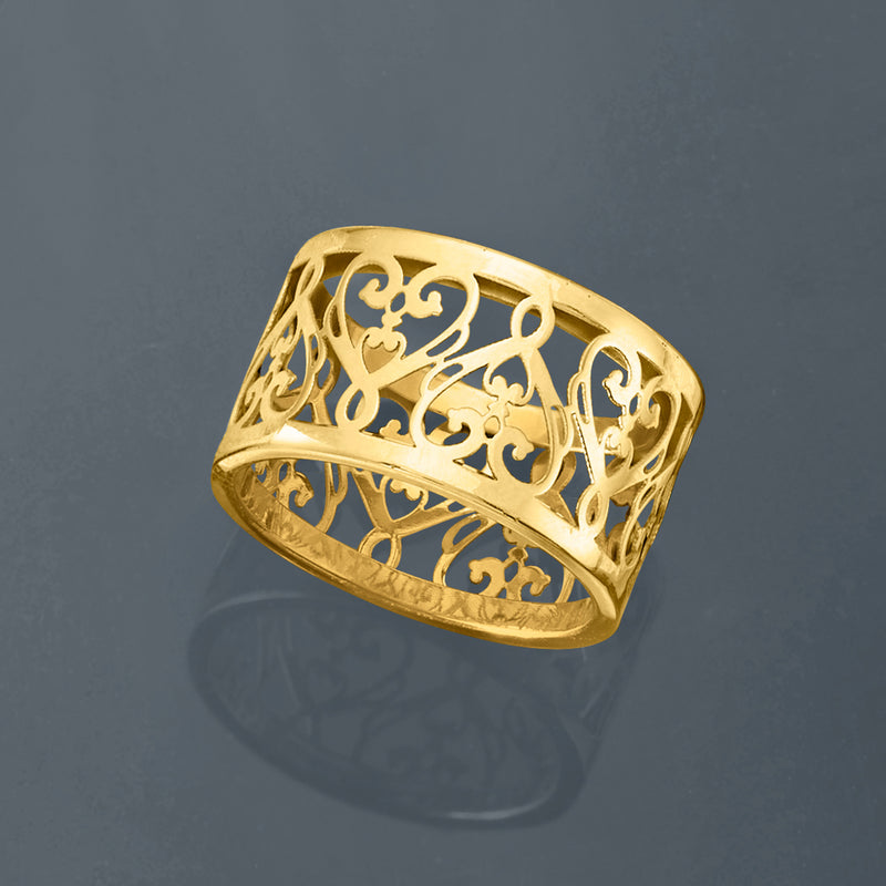 Yellow gold filigree heart ring with swirling vine motifs and pierced heart center.
