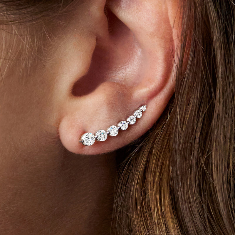 Diamond ear climber on ear with five round stones, 14kt white gold earwire