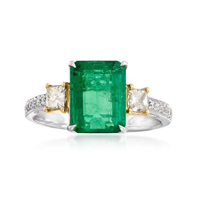 Two-tone gold ring with square emerald-cut green gemstone and diamond accents